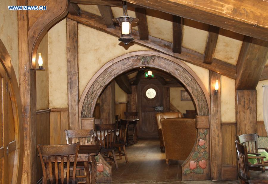 Photo taken on Nov. 29, 2012 shows a newely opened Green Dragon Pub at Hobbiton on the Alexander family farm near New Zealand's north island town of Matamata. The film set of "The Hobbit: An Unexpected Journey" is such fantastic in the rolling countryside that closely resembled the "Shire" in the popular classics by J.R.R Tolkien, attracting a lot of fans and tourists. (Xinhua/Liu Jieqiu)