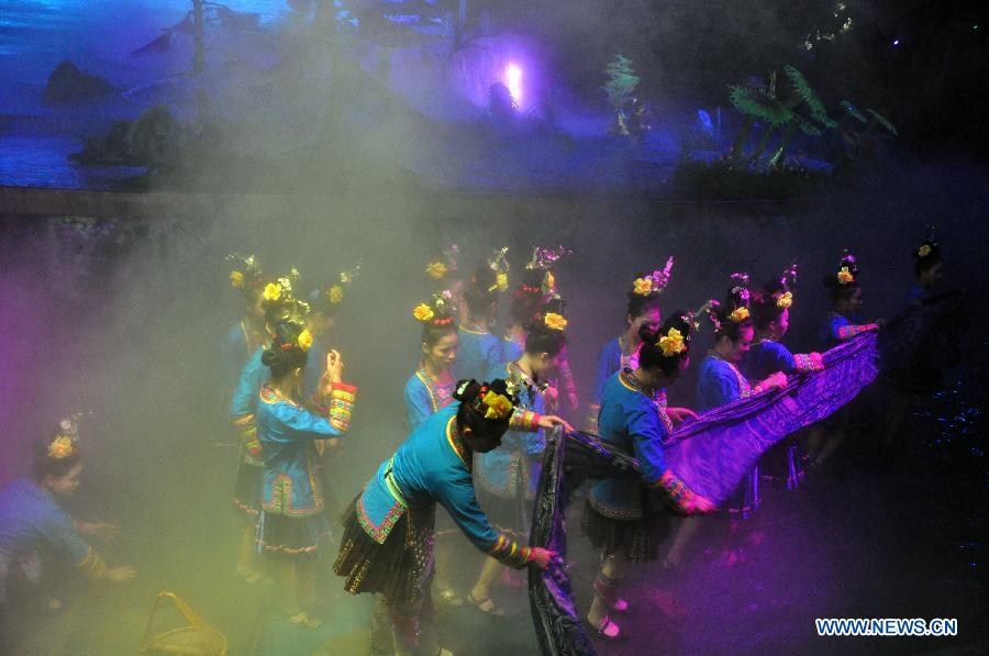 Dance drama "Zuo Ye", a traditional love and social activity of the Dong ethnic group, is performed during a festival in Sanjiang Dong Autonomous County of Liuzhou City, southwest China's Guangxi Zhuang Autonomous Region, Nov. 30, 2012. (Xinhua/Lai Liusheng) 