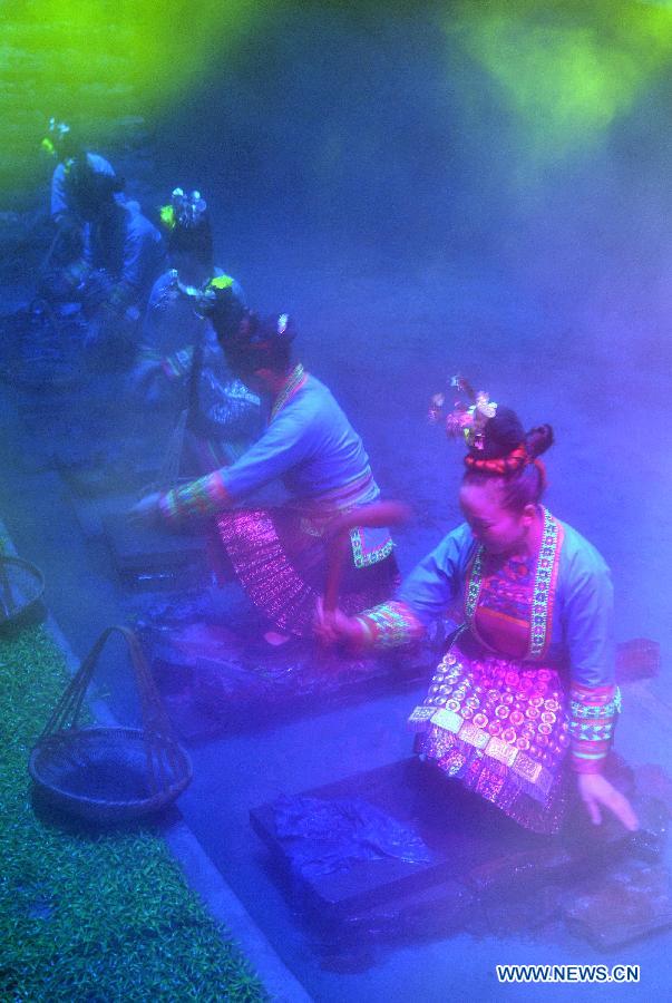 Dance drama "Zuo Ye", a traditional love and social activity of the Dong ethnic group, is performed during a festival in Sanjiang Dong Autonomous County of Liuzhou City, southwest China's Guangxi Zhuang Autonomous Region, Nov. 30, 2012. (Xinhua/Lai Liusheng) 