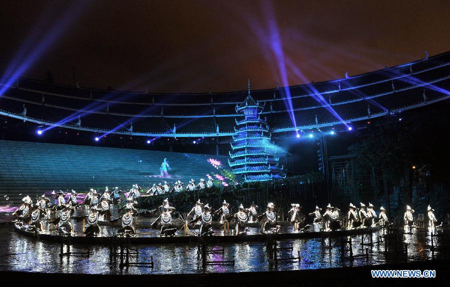 Dance drama "Zuo Ye", a traditional love and social activity of the Dong ethnic group, is performed during a festival in Sanjiang Dong Autonomous County of Liuzhou City, southwest China's Guangxi Zhuang Autonomous Region, Nov. 30, 2012. (Xinhua/Lai Liusheng) 