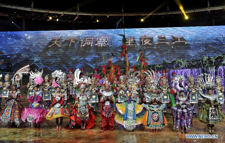 Dance drama "Zuo Ye", a traditional love and social activity of the Dong ethnic group, is performed during a festival in Sanjiang Dong Autonomous County of Liuzhou City, southwest China's Guangxi Zhuang Autonomous Region, Nov. 30, 2012. (Xinhua/Lai Liusheng) 