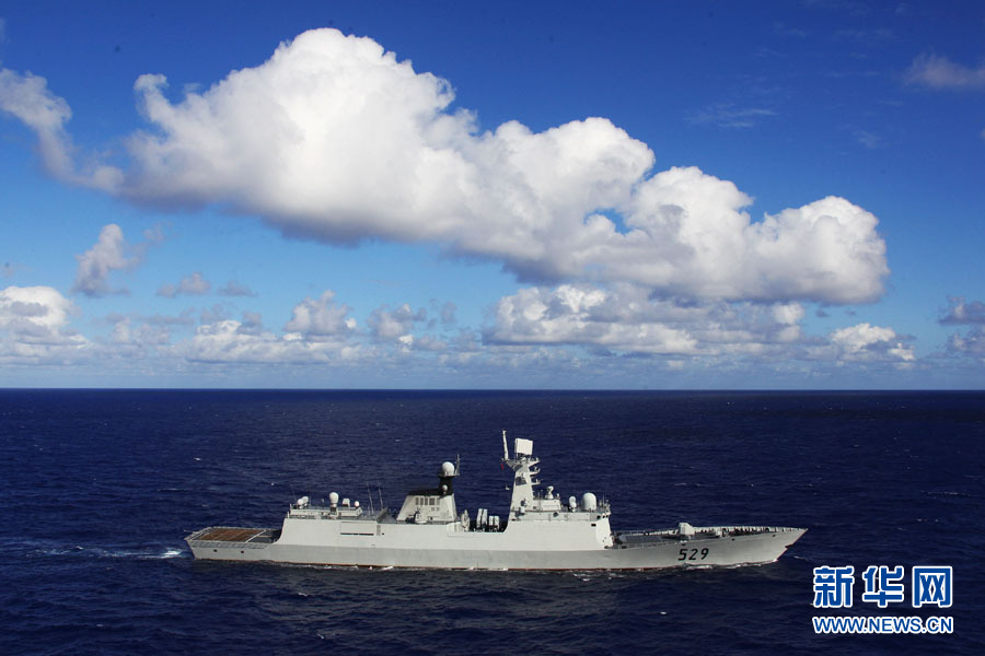 A fleet of the Navy of the Chinese People's Liberation Army (PLA) conducts search and rescue drills with a helicopter, in the western Pacific Ocean on December 1, 2012. (Xinhua/Sun Yanxin)