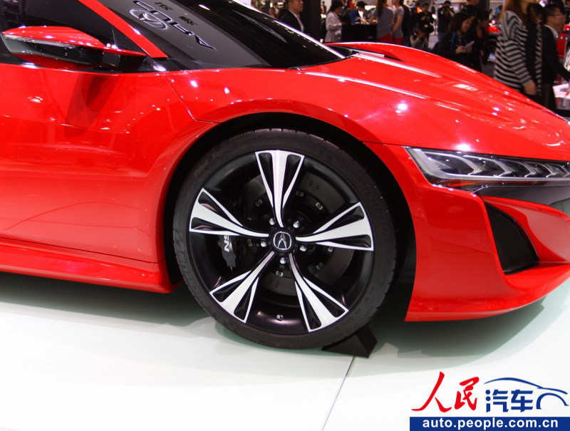 Honda's Acura NSX concept car shines at 2012 Guangzhou Auto Exhibition. (auto.people.com.cn)