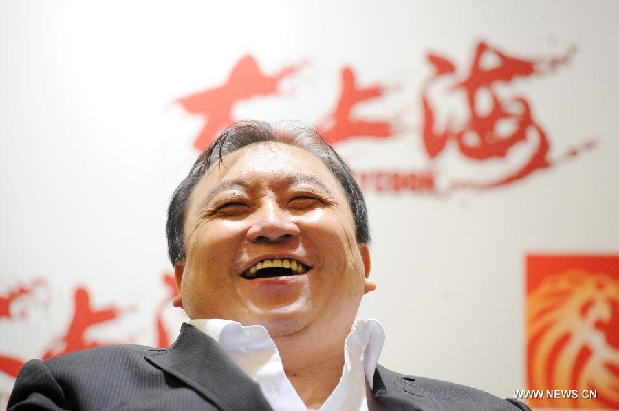 Chinese Hong Kong director Wong Jing attends the premiere press conference of the movie "The Last Tycoon" during the Screen Singapore 2012 held in Marina Bay Sands, Singapore, Dec. 4, 2012. (Xinhua/Then Chih Wey)