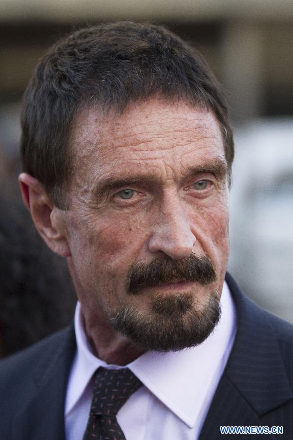 US anti-virus software pioneer John McAfee arrives to a news conference in front of the Supreme Court in Guatemala City, capital of Guatemala, on Dec. 4, 2012. McAfee, wanted for questioning over the murder of his neighbor last month in Belize, is seeking political asylum in Guatemala, according to local media. (Xinhua/Luis Echeverria) 