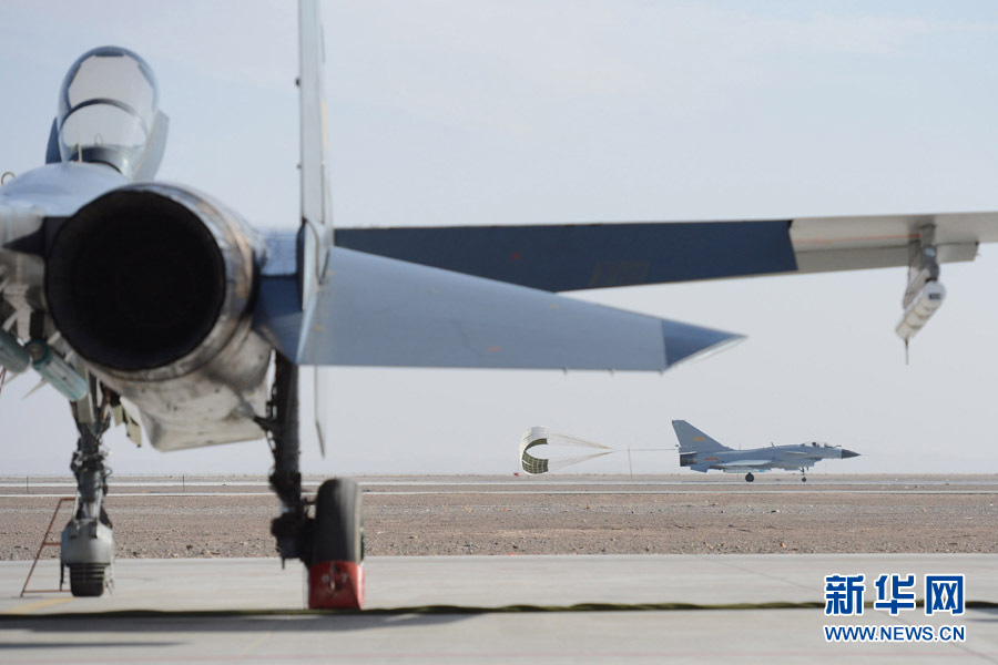 More than 100 top pilots from 14 aviation brigades and regiments of the Air Force of the Chinese People's Liberation Army (PLA) pilot their fighters to conduct an air combat confrontation training at an experimental training base of the PLA Air Force in northwest China. (Xinhua/Yu Hongchun)