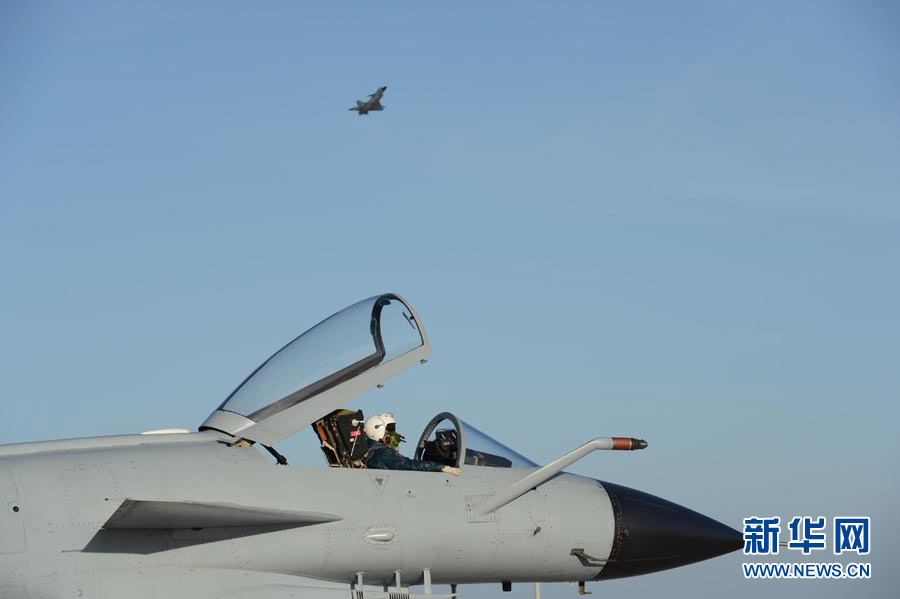 More than 100 top pilots from 14 aviation brigades and regiments of the Air Force of the Chinese People's Liberation Army (PLA) pilot their fighters to conduct an air combat confrontation training at an experimental training base of the PLA Air Force in northwest China. (Xinhua/Yu Hongchun)