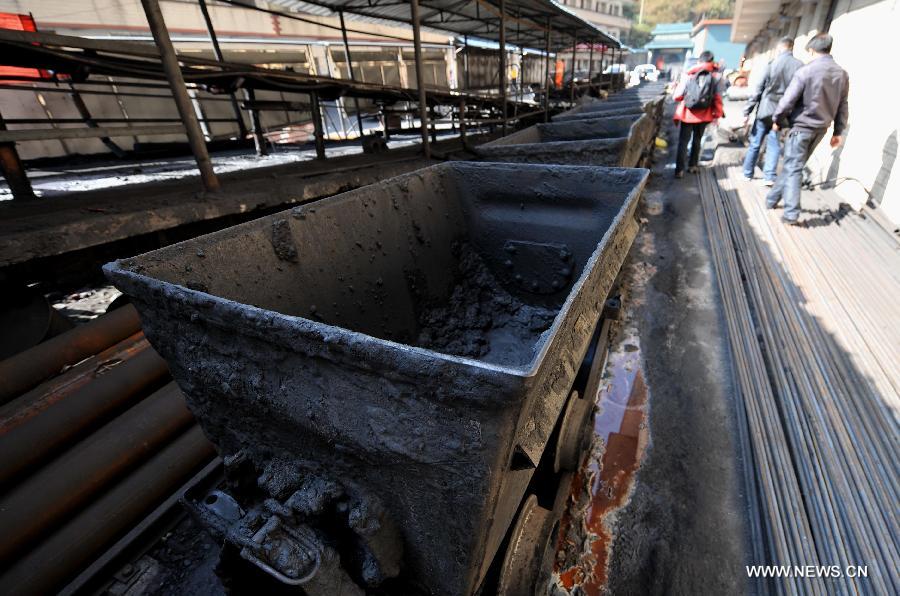 Photo taken on Dec. 6, 2012 shows the closed coal mine at the accident site of Shangchang Coal Mine in Fuyuan County, southwest China's Yunnan Province. Seventeen people have been confirmed dead and six others injured in a coal mine accident of coal and gas outburst occurred at the Shangchang Coal Mine in Huangnihe Township of Fuyuan County on Wednesday afternoon. (Xinhua/Lin Yiguang) 