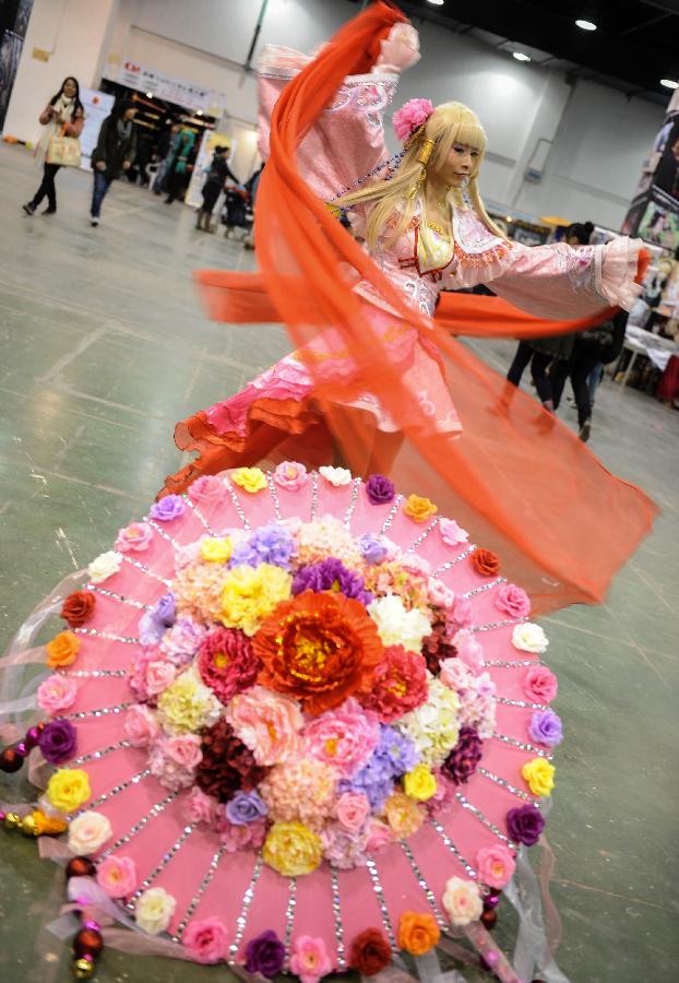 A cosplayer performs during the 1st Cosplay Cultural Festival in Hangzhou, capital of east China's Zhejiang Province, Dec. 9, 2012. The two-day festival closed on Sunday. (Xinhua/Han Chuanhao)