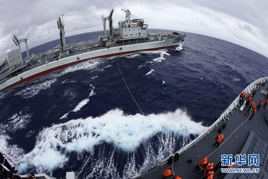 A taskforce of the Navy of the Chinese People's Liberation Army (PLA) completed underway comprehensive supply training in a sea area of the West Pacific Ocean on December 6, 2012. (Xinhua/Ju Zhenhua)