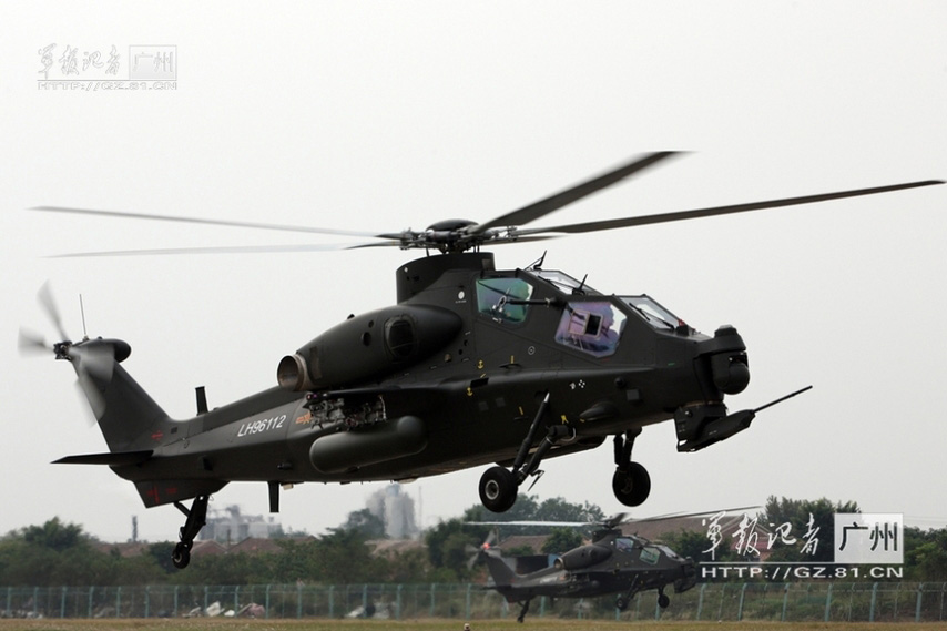 China's independently-developed WZ-10 armed helicopters of an army aviation brigade of the Guangzhou Military Area Command (MAC) of the Chinese People's Liberation Army (PLA) are in training. (China Military Online/Li Sanhong)