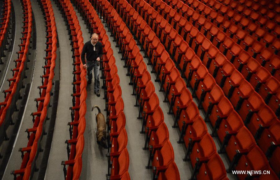 A staff member makes security check during the preparation for 2012 Nobel award ceremony at Concert Hall in Stockholm, capital of Sweden on Dec. 10, 2012. (Xinhua/Wu Wei) 