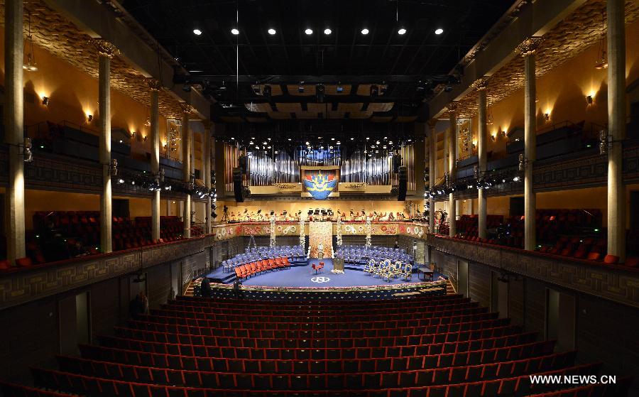 Staff make final preparations for 2012 Nobel award ceremony at Concert Hall in Stockholm, capital of Sweden on Dec. 10, 2012. (Xinhua/Wu Wei)  