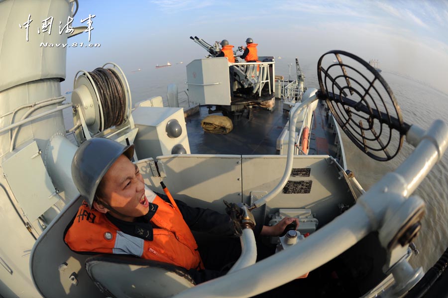 A ship formation under the East China Sea Fleet of the Navy of the Chinese People's Liberation Army (PLA) conducted actual-combat drill in a training sea area to enhance its actual combat capability. (navy.81.cn/Jiang Shan)