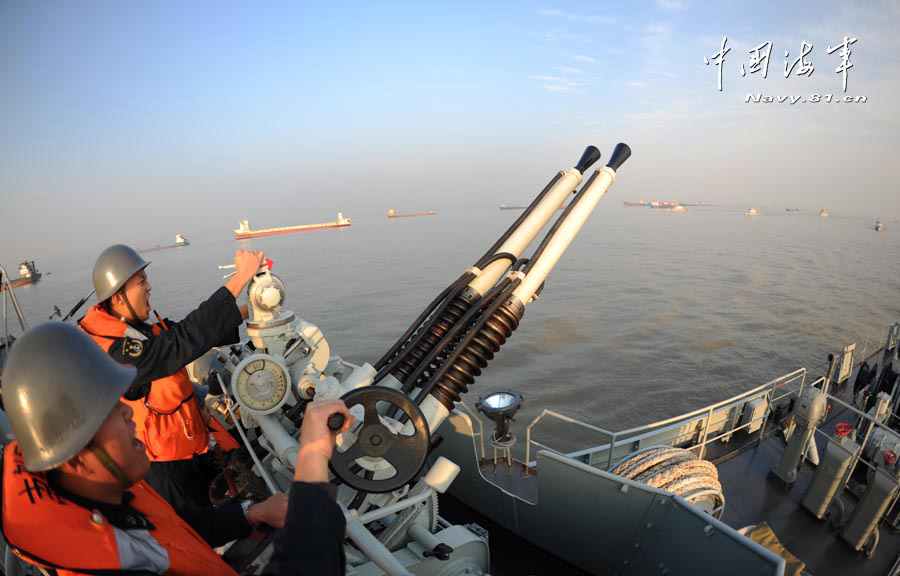 A ship formation under the East China Sea Fleet of the Navy of the Chinese People's Liberation Army (PLA) conducted actual-combat drill in a training sea area to enhance its actual combat capability. (navy.81.cn/Jiang Shan)