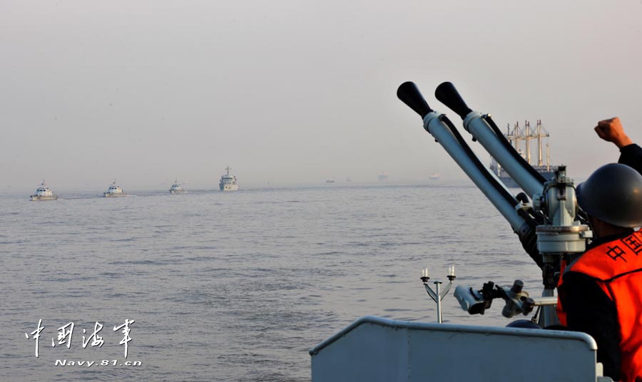 A ship formation under the East China Sea Fleet of the Navy of the Chinese People's Liberation Army (PLA) conducted actual-combat drill in a training sea area to enhance its actual combat capability. (navy.81.cn/Jiang Shan)