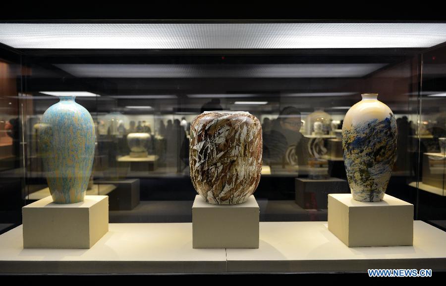 Photo taken on Dec. 12, 2012 shows porcelain artworks created by Chinese artist Pan Lusheng at Pan's solo art exhibition in Shandong Museum in Jinan, capital of east China's Shandong Province. Nearly 100 pieces of porcelain artworks by Pan were displayed at the exhibition which kicked off on Wednesday. (Xinhua/Zhu Zheng)