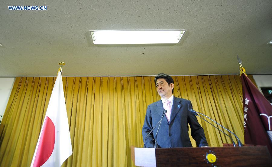 Shinzo Abe, leader of Japan's Liberal Democratic Party (LDP), attends a press conference at the headquarters of LDP in Tokyo, Japan, Dec. 17, 2012. LDP won by a landslide in Sunday's House of Representatives election as it solo secured 294 seats in the election. (Xinhua/Kenichiro Seki) 