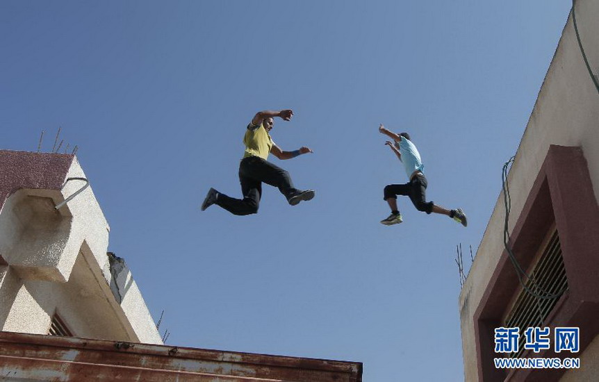 Palestinian boys practice "Parkour" skill in Khan Younis, Gaza on Oct. 7, 2012. (Xinhua/AFP