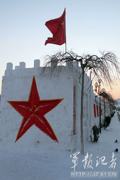 The officers and men of a regiment of the Shenyang Military Area Command (MAC) of the Chinese People's Liberation Army (PLA) carefully craft a snow Great Wall. After ten days efforts, a 120 meters long, three meters high snow Great Wall with a "Hexie" locomotive was completed in the barracks square. (China Military Online/Zhang Baojia, Tian Yabing)