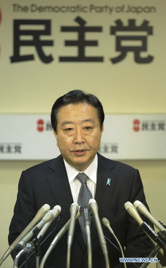 Japan's outgoing Prime Minister Yoshihiko Noda speaks during a meeting of the lawmakers of the Democratic Party of Japan (DPJ), in Tokyo, on Dec. 19, 2012. The Democratic Party of Japan (DPJ) on Wednesday postponed its leadership election scheduled for Saturday after the party encountered a fiasco in lower house race held on Sunday. (Xinhua/Kenichiro Seki) 