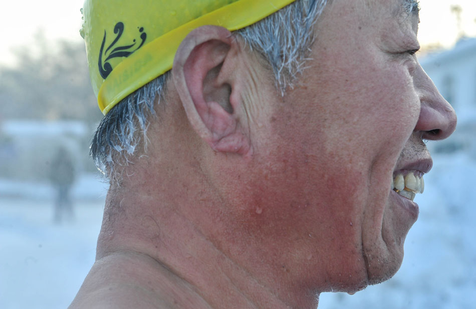 Frosted hairs are seen after a man swam in the bone-chilling lake water in Changchun, capital city of northeast China’s Jilin province, Dec. 18, 2012. (Xinhua/Wu Haofei)