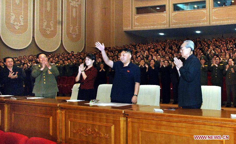 Kim Jong Un (2nd R), top leader of the Democratic People's Republic of Korea (DPRK), and his wife Ri Sol Ju (3rd R) watch a performance in Pyongyang, capital of DPRK, in this picture released by Korean Central News Agency on July 27, 2012. Kim Jong Un watched a performance staged in Pyongyang on July 26 to mark the 59th anniversary of the end of the Korean War. (Xinhua/KCNA)