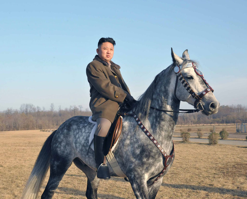 DPRK's top leader Kim Jong Un inspects the training ground of horse riding company of KPA on Nov. 19, 2012. (Photo/ People’s Daily Online)