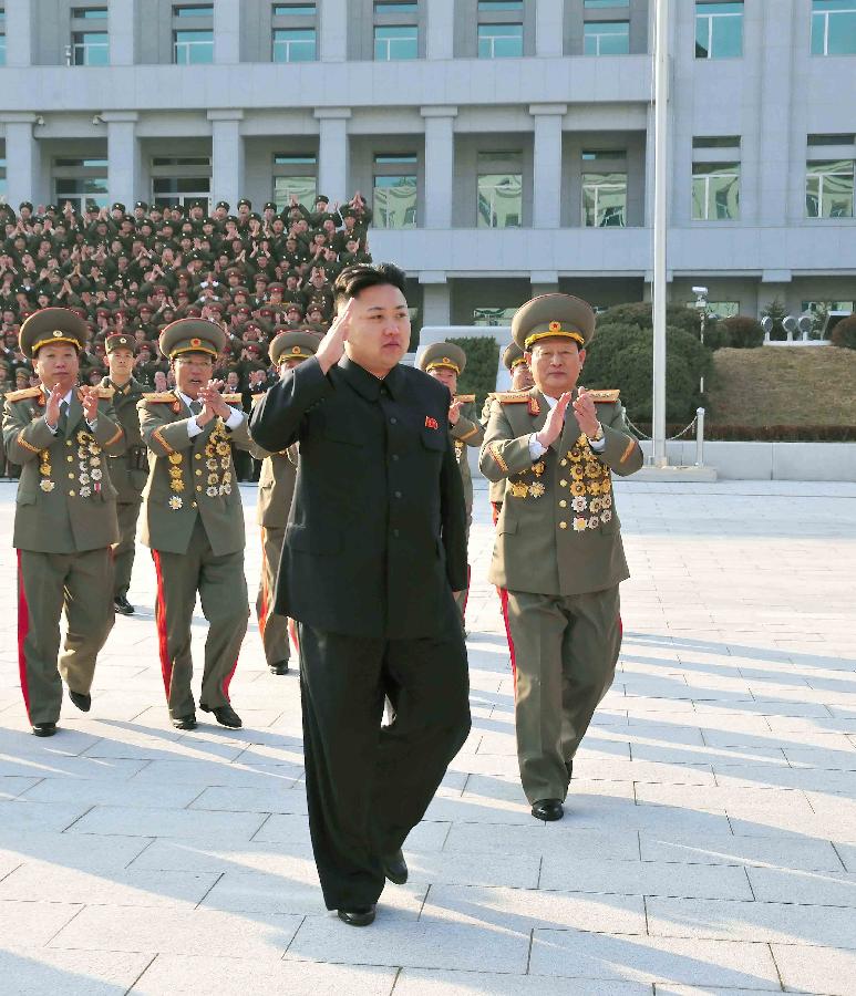 This photo provided by KCNA on Nov. 21, 2012 shows Kim Jong Un (Front), top leader of the Democratic People's Republic of Korea (DPRK), visits the Ministry of State Security, on Nov. 20, 2012. (Xinhua/KCNA)