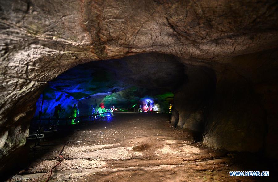 Photo shows the interior scene at the Xianren Cave in Dayuan Township of Wannian County, east China's Jiangxi Province. Xianren Cave is the location for historically important finds of prehistoric pottery sherds and rice remains. (Xinhua/Zhou Ke) 