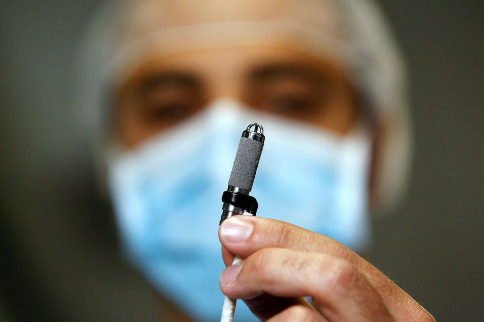 An artificial heart weighed 11 grams is seen in a hospital in Rome, Italy, May 24, 2012. The world’s smallest heart was successfully transplanted into a baby patient of 16 months old. (Xinhua/Reuters)