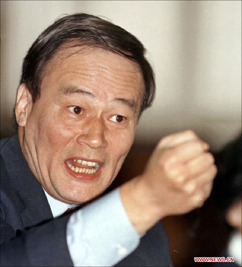 File photo taken in March 1999 shows Wang Qishan speaks within the delegation of south China's Guangdong Province while attending the 2nd Session of the 9th National People's Congress (NPC). (Xinhua) 