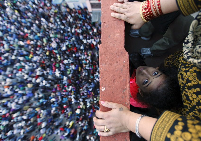 A nine-day festival takes place during Nepalese New Year; a child looks at Bisket festival parade in Bhaktapur on April 13, 2012. (Reuters/ /Navesh Chitrakar)