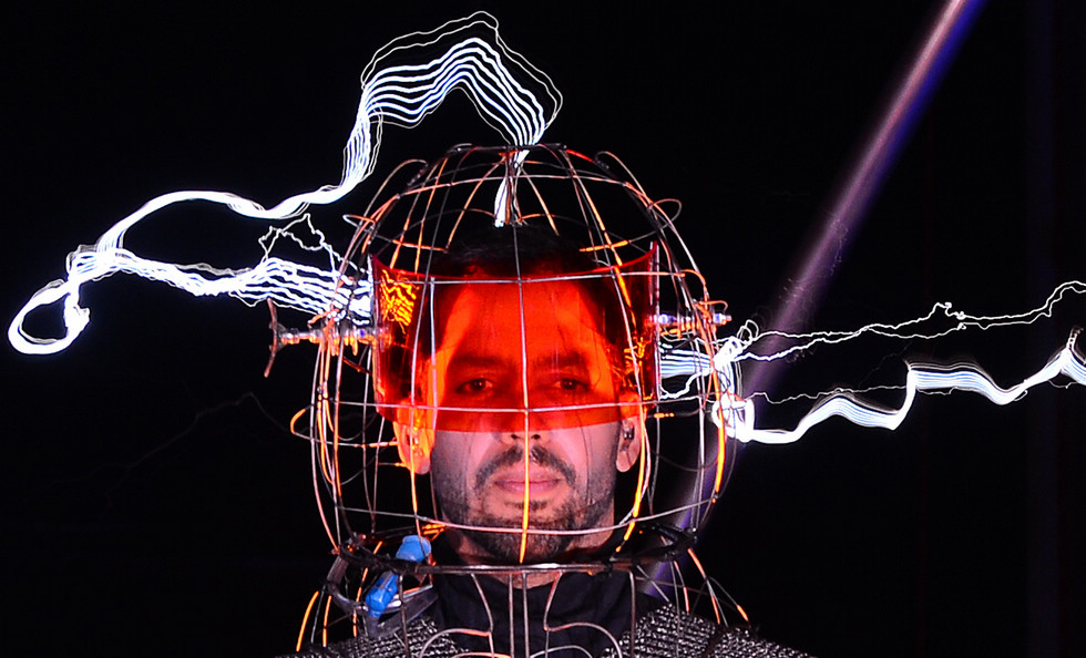 U.S. magician David Blaine performs "Electrified", his three days and three nights magic performance, at Pier 54, New York, the United States, Oct. 8, 2012. David Blaine has been surrounded by towering metallic orbs that will stream 1 million volts of electricity around him for the past 72 hours. (Xinhua/Wang Lei) 