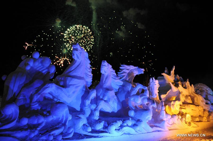 Photo taken on Dec. 25, 2012 shows a snow sculpture in border city Manzhouli in north China's Inner Mongolia Autonomous Region. The 14th China, Russia and Mongolia Ice and Snow Sculpture Festival kicked off here on Tuesday. (Xinhua/Asigang)