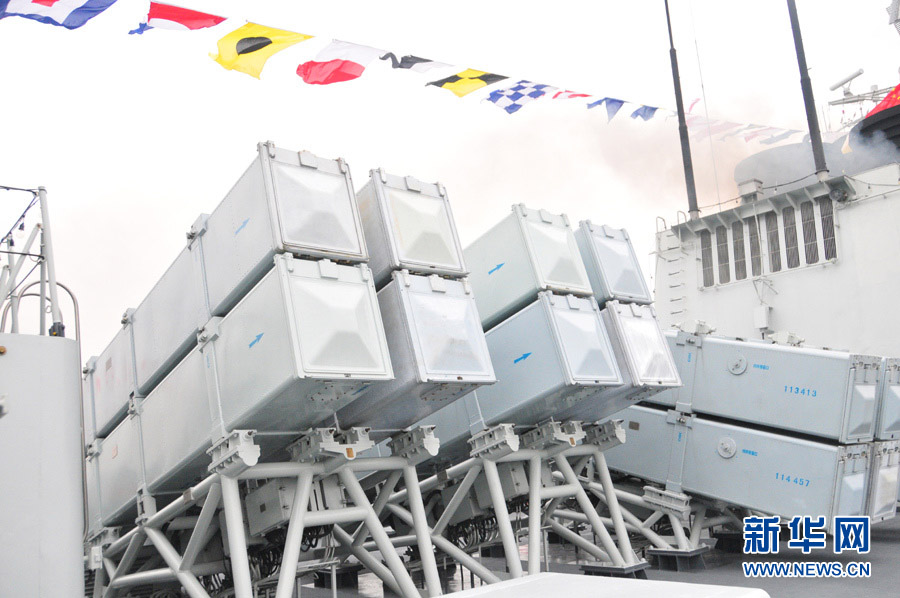 The "Guangzhou" guided missile destroyer under the South China Sea Fleet of the Navy of the Chinese People's Liberation Army (PLA) is open to the public on December 26, 2012. The photo features the scene of the anti-ship missile launch containers. (Xinhua/An Chen)