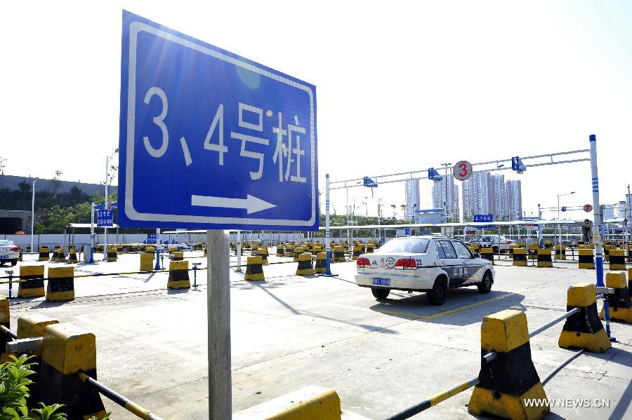 Photo taken on Dec. 31, 2012 shows a behind-wheel exam venue rebuilt under requirements of the revised traffic regulation in Shenzhen, south China's Guangdong Province. The revised traffic regulation takes effect on Tuesday. According the new rules, 52 different sorts of violations can result in deducting points for punishment, up from 38 under the previous regulation. (Xinhua/Liang Xu) 