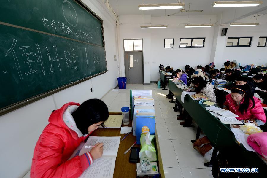 Students prepare for the upcoming National Entrance Examination for Postgraduate (NEEP) at a classroom in Anhui University in Hefei, capital of east China's Anhui Province, Jan. 3, 2013. Examinees taking the NEEP scheduled on Jan. 5 have rocketed up to 1.8 million this year, hitting an all-time high. (Xinhua/Zhang Rui) 