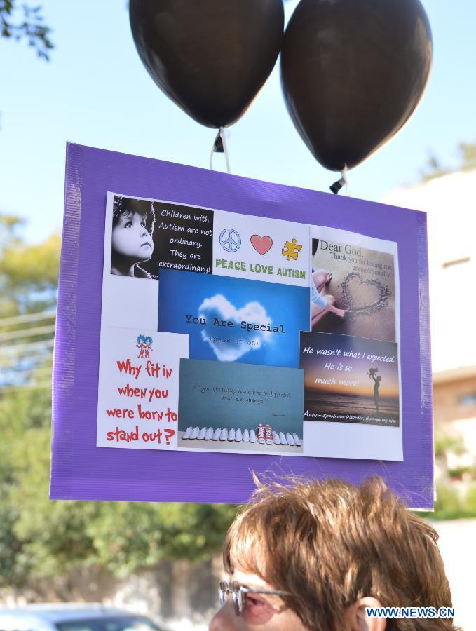 Israelis rally in protest of shrinking government funding for children with autism in Jerusalem, on Jan. 4, 2013. According to the data published by the Ministry of Welfare and Social Affairs, every one in 100 babies born in Israel suffers from autism. In addition, the data revealed that since 2000 the number of children registered with the ministry as suffering from autism has multiplied by no less than 50 times, from 156 in 2000 to 7,899 in 2012. However, the budget in the ministry allocated to helping people with autism only increased by 9.5 throughout this period. (Xinhua/Yin Dongxun)