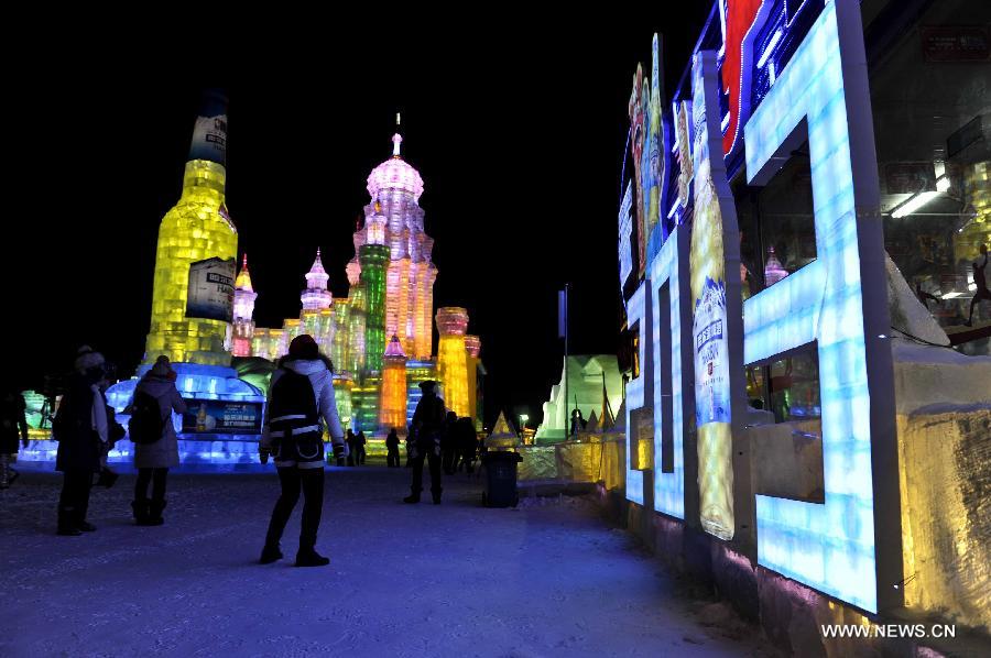 Visitors walk around in the Ice and Snow World during the 29th Harbin International Ice and Snow Festival in Harbin, capital of northeast China's Heilongjiang Province, Jan. 5, 2013. The festival kicked off on Saturday. (Xinhua/Wang Song)