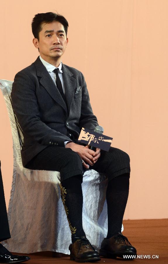 Actor Tony Leung attends the premiere ceremony of Hong Kong director Wong Kar Wai's new film "The Grandmaster" in Beijing, capital of China, Jan. 6, 2013. The film will be released on Tuesday. (Xinhua/Jin Liangkuai)