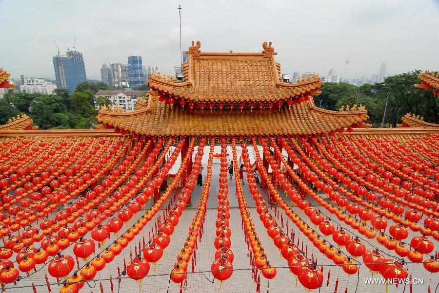 Red lanterns are seen in Thean Hou Temple in Kuala Lumpur, capital of Malaysia, on Jan. 7, 2013. Red lanterns are decorated to greet the upcoming Chinese Lunar New Year, Year of the Snake. (Xinhua/Chong Voon Chung) 