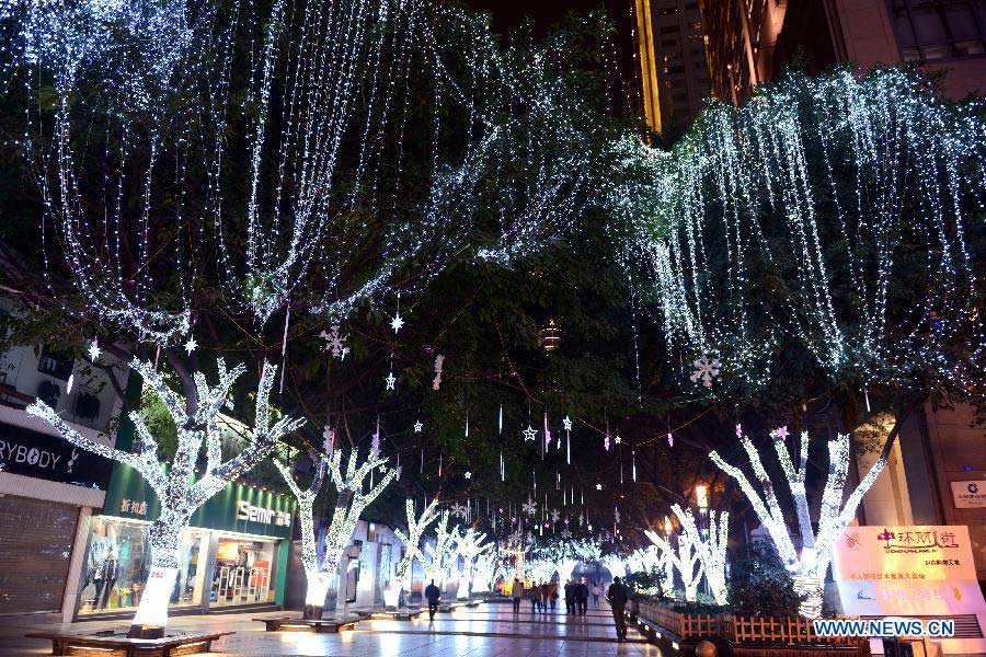 Photo taken on Jan. 6, 2013 shows the night scene on the Jiefangbei Street in southwest China's Chongqing. Many roads and squares in the city were decorated with lights to greet the Spring Festival which falls on Feb. 10 this year. (Xinhua/Zhong Guilin)