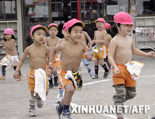 Children run in a kindergarten in Tokyo, Japan, Jan. 21, 2008.(Photo/ Xinhua)