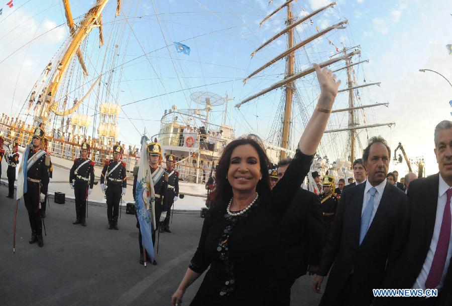 Argentina's President Cristina Fernandez (C) heads the ceremony for Argentina's Frigate Libertad's arrival in the port of Mar del Plata, Argentina, Jan. 9, 2013. The Frigate Libertad, which was held in Ghana from Oct. 2 to Dec, 19, 2012 due to a court order, arrived in Mar del Plata on Wednesday, according to local press. (Xinhua/TELAM)