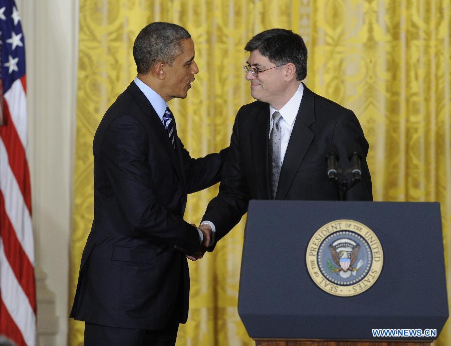 U.S. President Barack Obama (L) shakes hands with White House Chief of Staff Jacob Lew during a nomination ceremony in the East Room of the White House in Washington D.C., capital of the United States, Jan. 10, 2013. U.S. President Barack Obama on Thursday picked White House Chief of Staff Jacob Lew as the next Treasury Secretary succeeding Timothy Geithner, a big step of shaping his economic team. (Xinhua/Zhang Jun) 