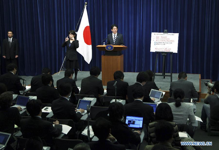 Japanese Prime Minister Shinzo Abe attends a press conference in Tokyo, Japan, Jan. 11, 2013. The Japanese cabinet on Friday approved a stimulus package worth 20 trillion yen (about 224 billion U.S. dollars), aiming to shore up Japan's current stagnant economy by beating chronic deflation and tackling the strong yen, Prime Minister Shinzo Abe told a press conference.(Photo/Xinhua)