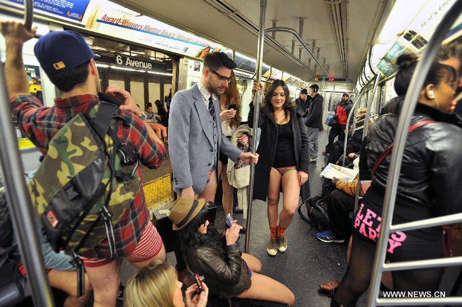 Participants take part in the No Pants Subway Ride in New York, the United States, on Jan. 13, 2013. (Xinhua/Wang Lei)