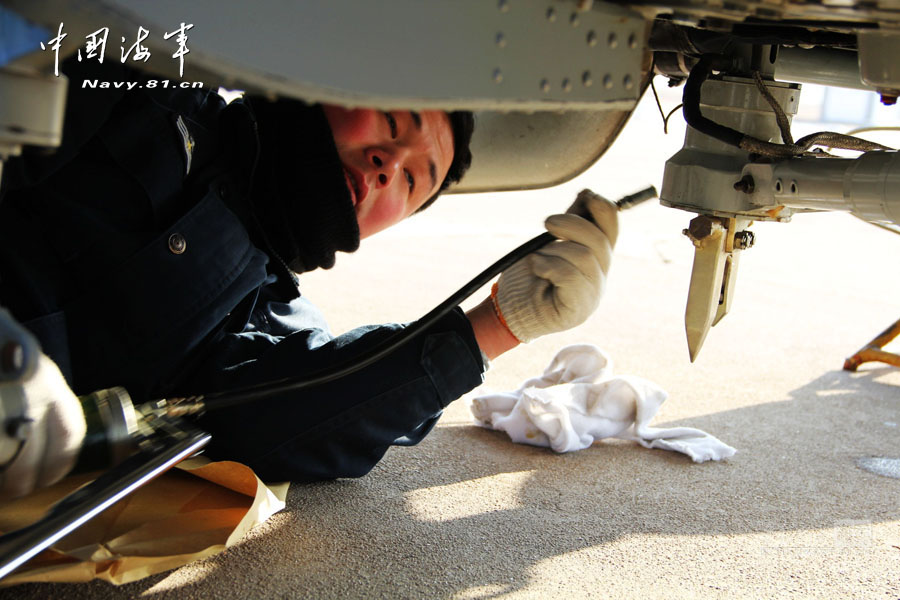 A carrier-based aircraft regiment under the North Sea Fleet of the Navy of the Chinese People's Liberation Army (PLA) conducts flight training at an airport in Shandong province, in a bid to temper the tactical skills of warplane pilots. (navy.81.cn/Hu Baoliang, Zhang Xiaobang)