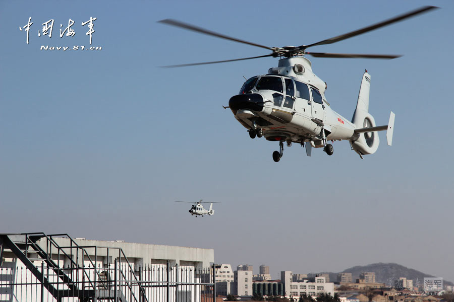 A carrier-based aircraft regiment under the North Sea Fleet of the Navy of the Chinese People's Liberation Army (PLA) conducts flight training at an airport in Shandong province, in a bid to temper the tactical skills of warplane pilots. (navy.81.cn/Hu Baoliang, Zhang Xiaobang)